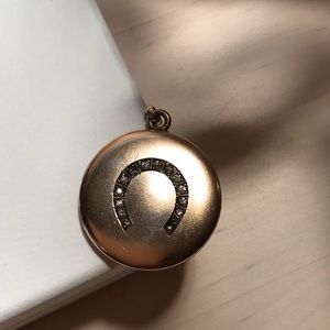 Antique gold filled locket, round with horseshoe crystal design